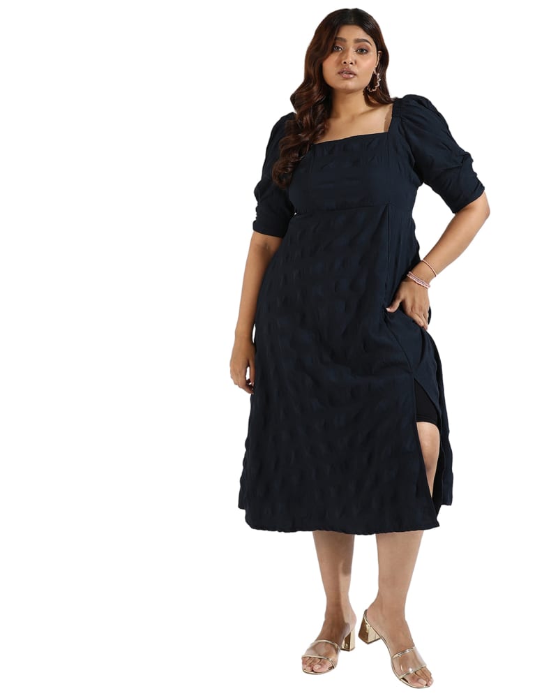 Front of a model wearing a size 5XL Women Solid Black Side Slit Dresses in Navy by Instafab Plus. | dia_product_style_image_id:294363